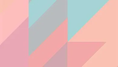 Abstract geometric pattern of pastel pink, peach, light blue, and grey triangles and polygons.